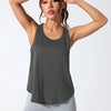 A woman models a dark gray stylish letter design running and yoga vest.