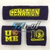 Two dark blue embroidered cotton sports wristbands featuring yellow text and a graphic.