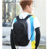 A person wearing a black large capacity waterproof outdoor hiking backpack over a white shirt and yellow accents.