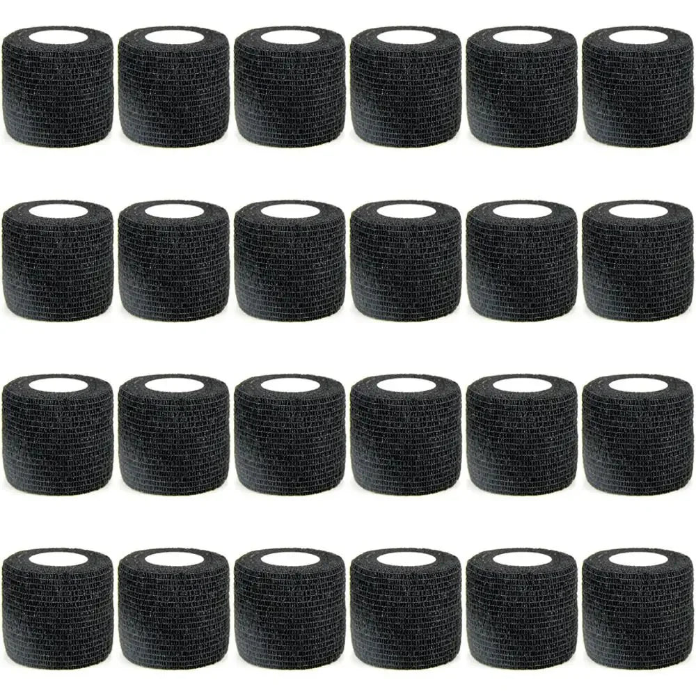 A set of black durable self-adhesive sports bandages rolled into cylindrical tubes.