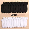 A set of 20 black ankle socks laid out in a row.