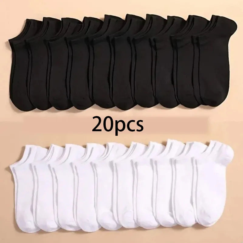 A set of 20 black ankle socks laid out in a row.