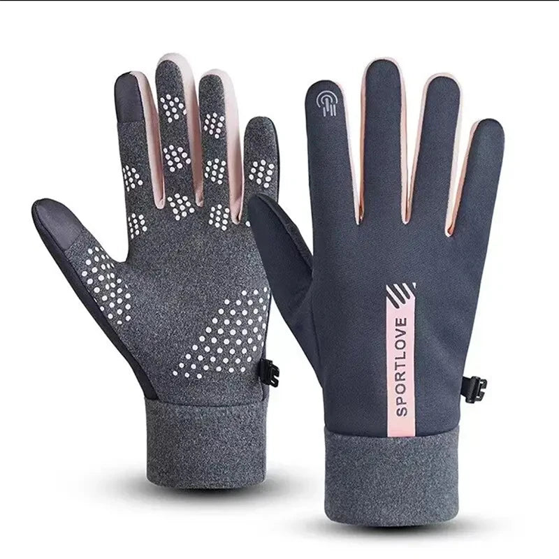A pair of dark gray thermal cycling and running gloves with pink accents shown against a white background.