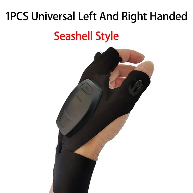 A hand is wearing a black Seashell style universal left and right handed tactical glove with an LED flashlight feature.