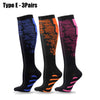 Three pairs of Type E sport compression socks in black, orange, and purple patterns.
