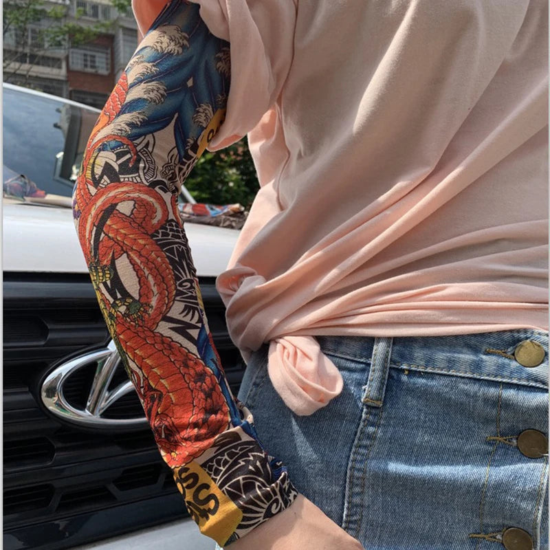 Close-up of a person wearing colorful patterned arm warmers while sitting in a car.