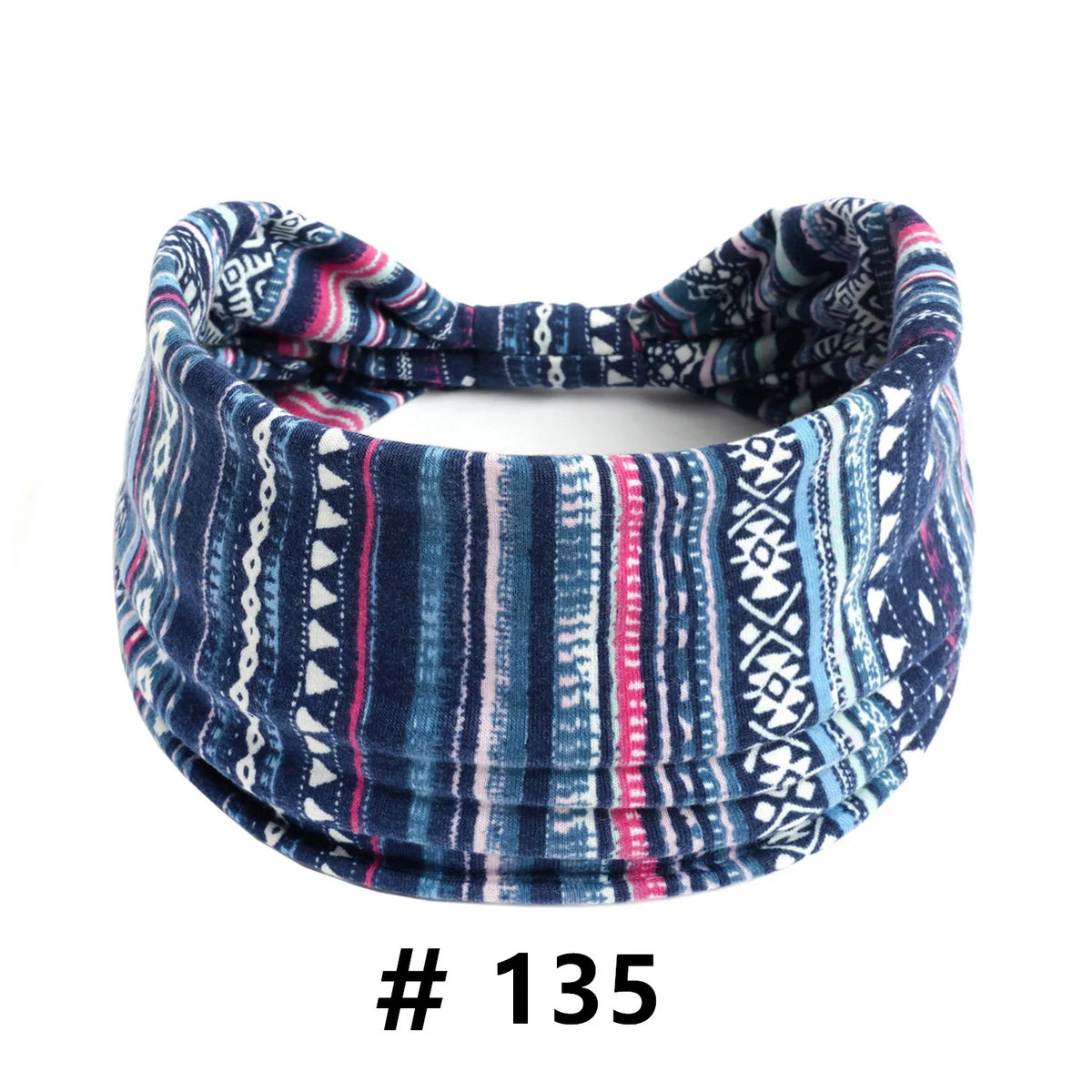 A navy blue and pink patterned knitted headband for yoga or workout.