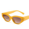 Yellow Y2K cat eye rhinestone sunglasses viewed from the front