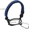 Black paracord strap with blue accents used as a water bottle holder and carrying loop.