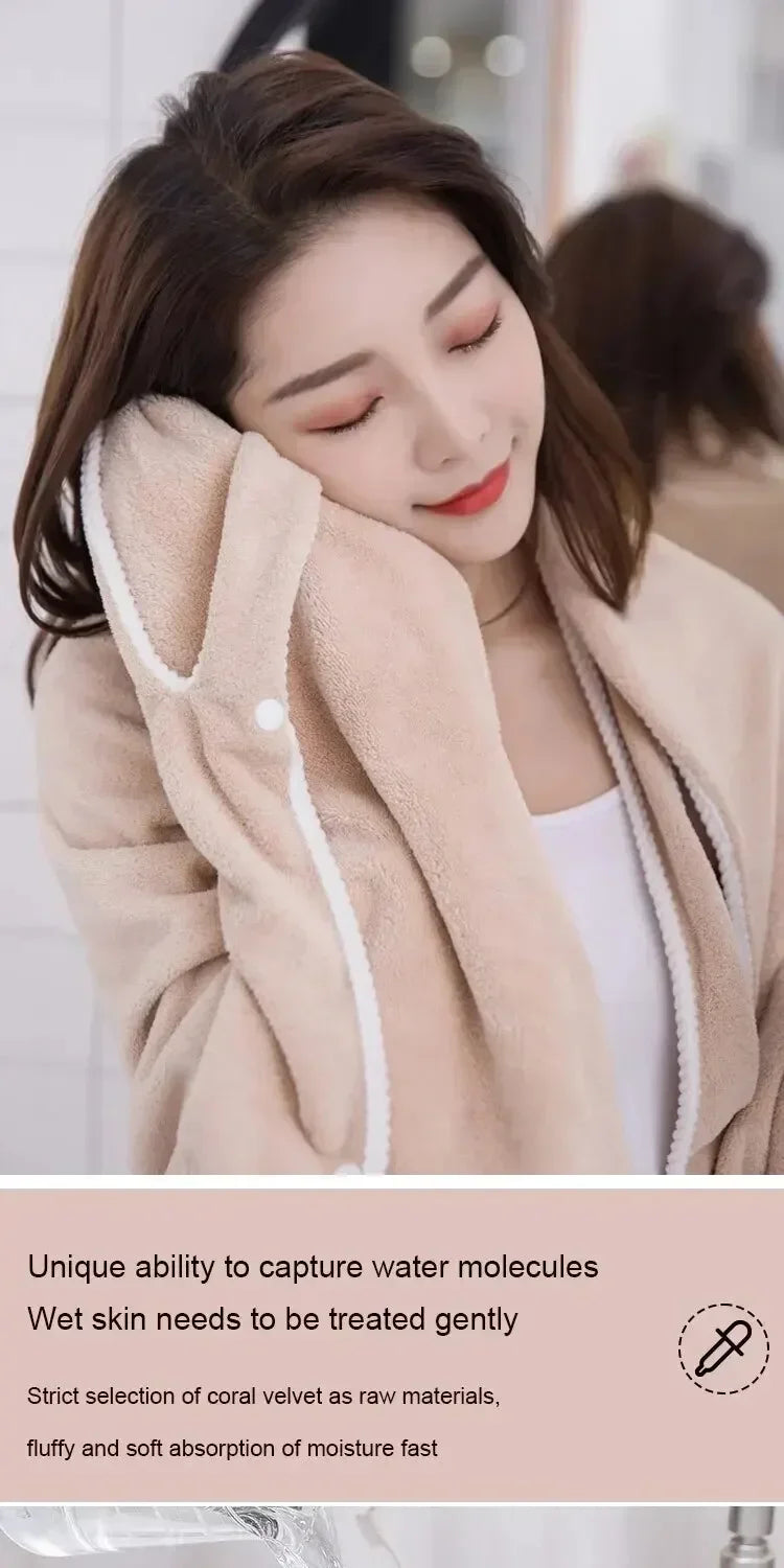 A woman wearing a beige fleece bath robe, highlighting its gentle texture and moisture absorption properties.
