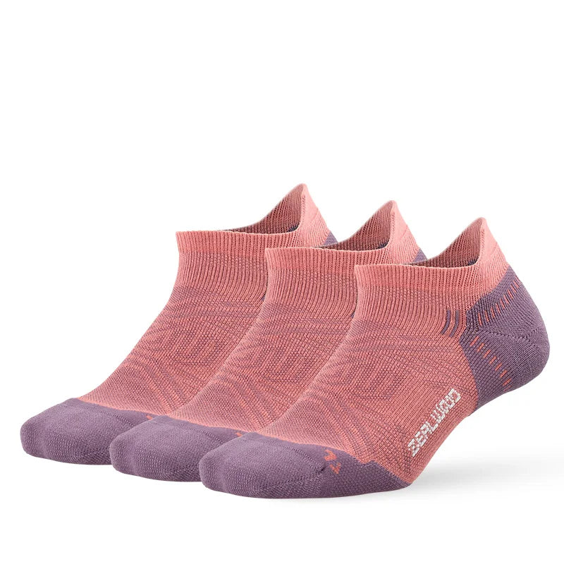 A set of breathable performance running socks in shades of pink and purple.