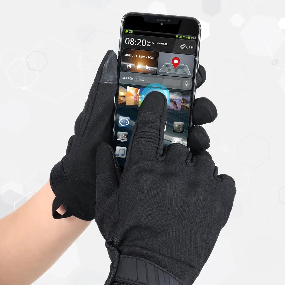 A hand wearing black full finger gloves is holding a smartphone displaying a music app interface.