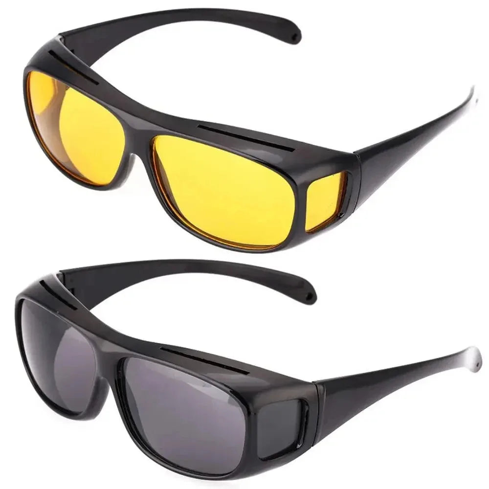 A pair of black and yellow night vision driving sunglasses shown in a top-down view.