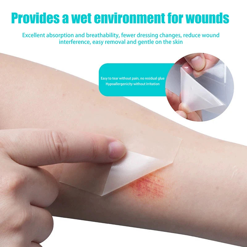 A hand applies a hydrocolloid wound care patch to a small wound on the skin.