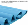 Folded light blue microfiber quick-dry beach towel showing its fabric texture and edge.