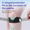 A hand is applying a V-shaped silicone knee pad to the patella area of a leg for flexible exercise and joint protection.