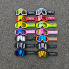 A collection of various colored sport-grade skiing goggles with FBFU branding displayed on asphalt.