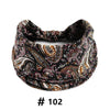 A black and white boho print cotton headband with an elastic band.