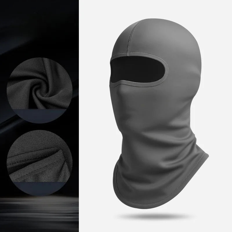 A gray thermal balaclava head covering shown in detail with a folded texture and a full view of the product.