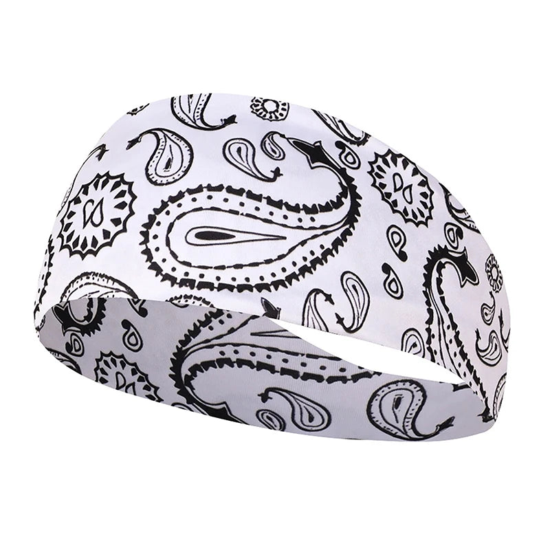 White patterned elastic sports headband with paisley and floral designs