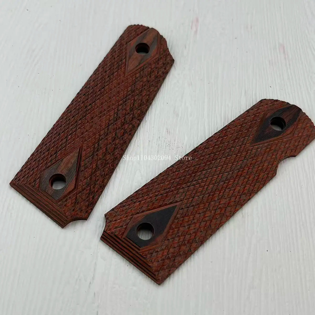 Two dark brown rosewood DIY knife grip patches with textured patterns and mounting holes