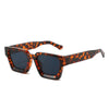 Retro square frame sunglasses with an orange leopard print pattern and dark lenses