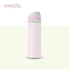 A pink insulated stainless steel tumbler with a silver straw lid.