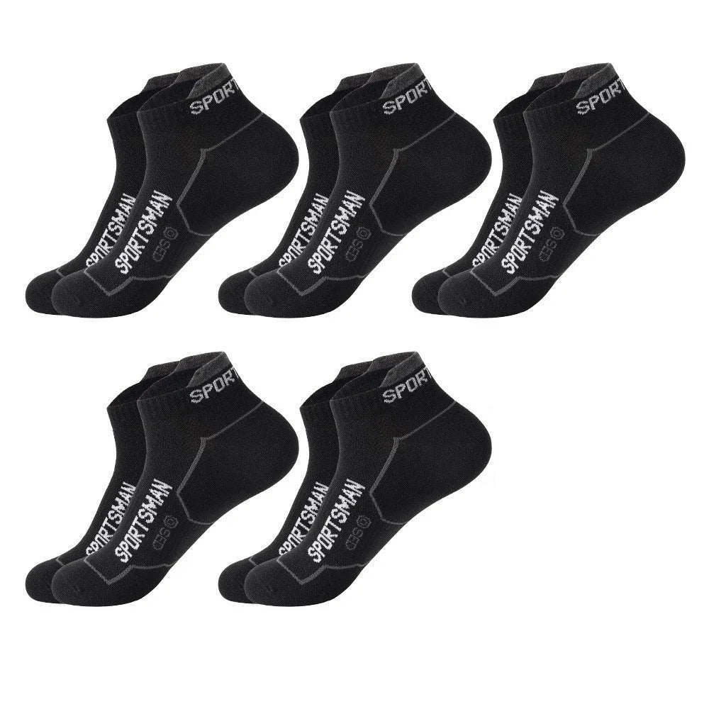 A pack of five black men's breathable mesh performance socks laid out for display.
