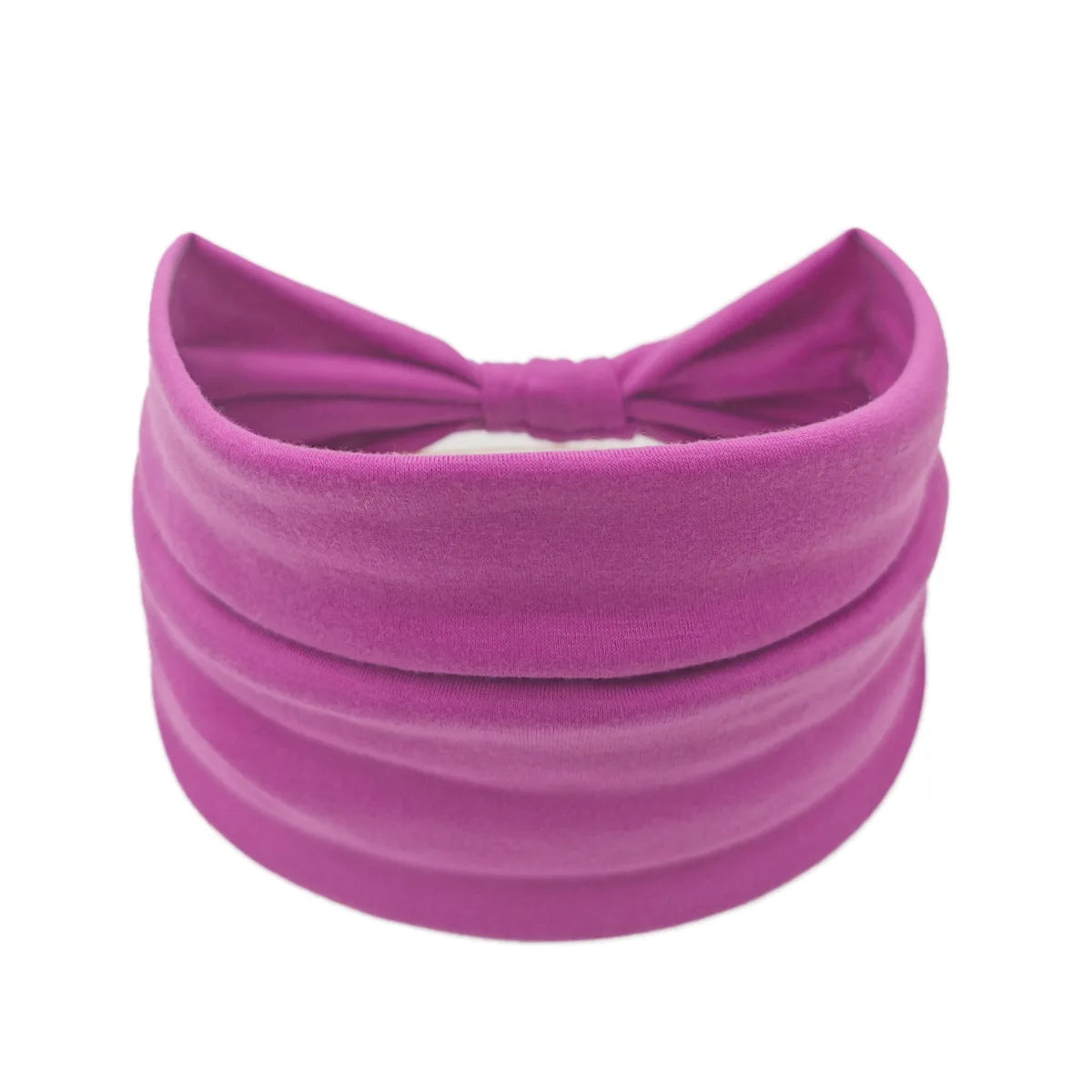 A wide, purple fabric headband or hair wrap for women.