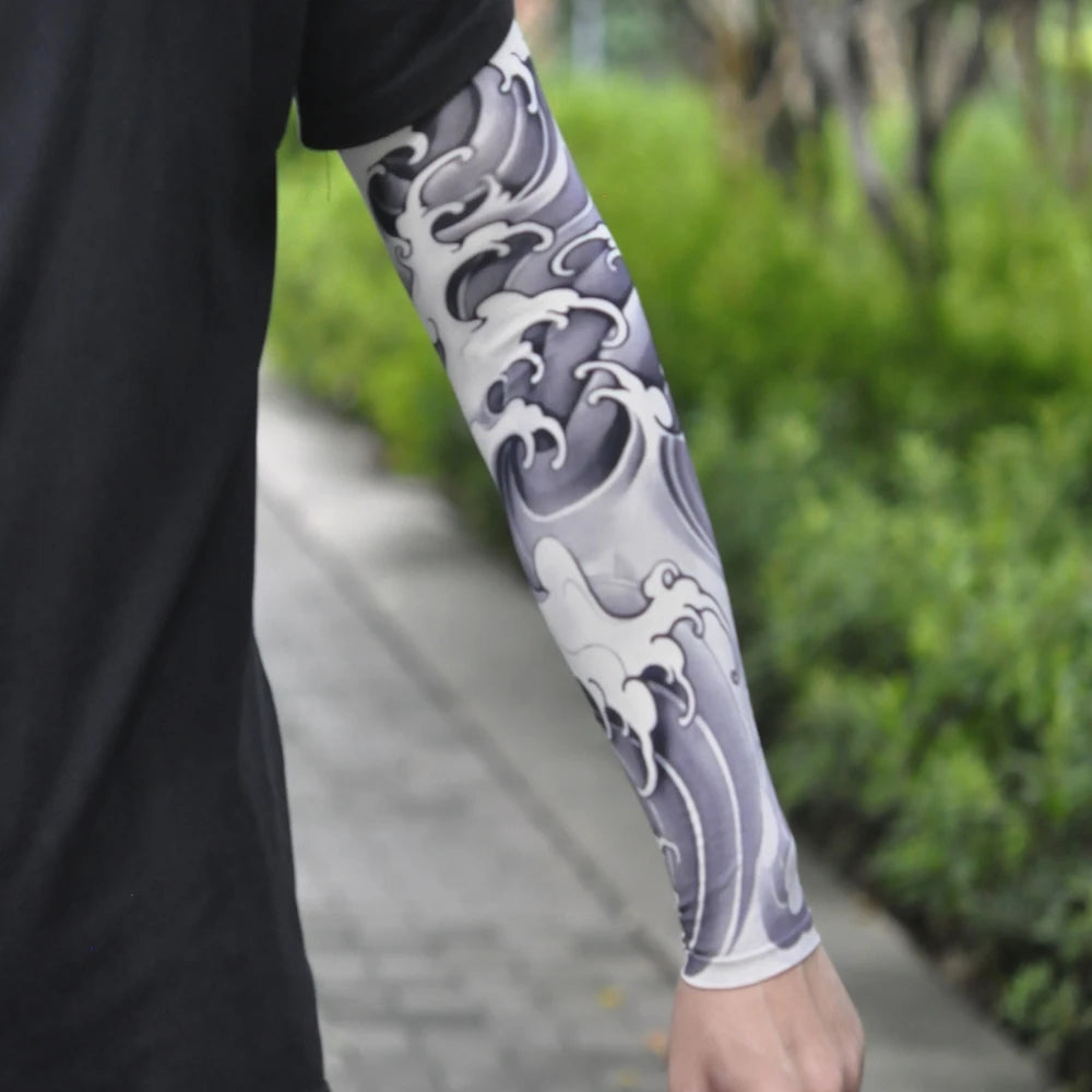 Close-up of a person wearing white and gray ice silk tattoo sleeves for sun protection