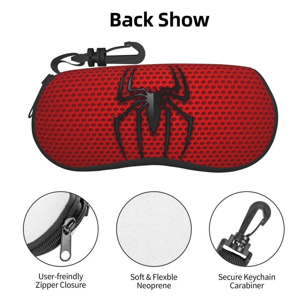 Red fabric pouch with a black spider web design and a keychain carabiner attached