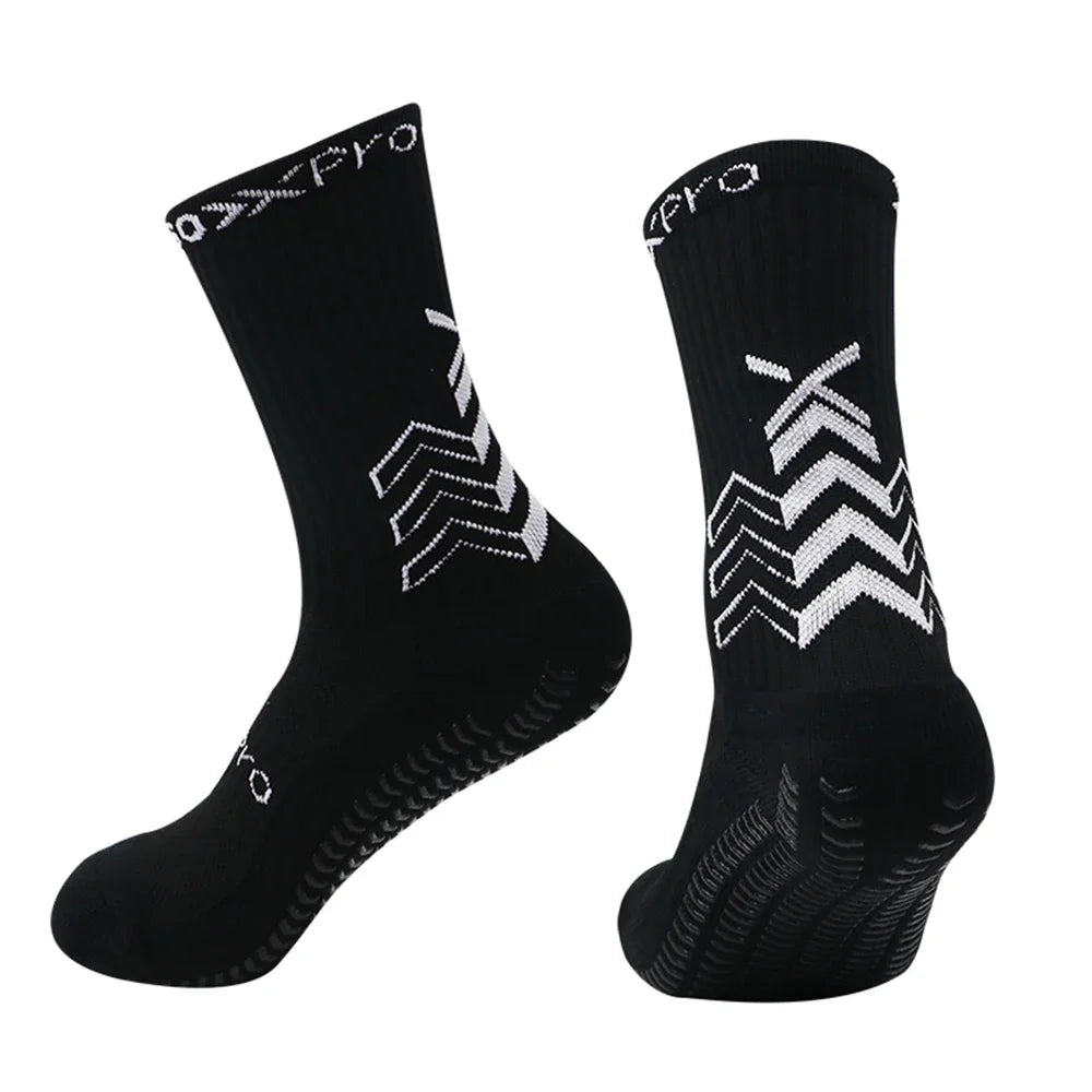 A pair of black unisex athletic sports socks with a geometric pattern on the leg.