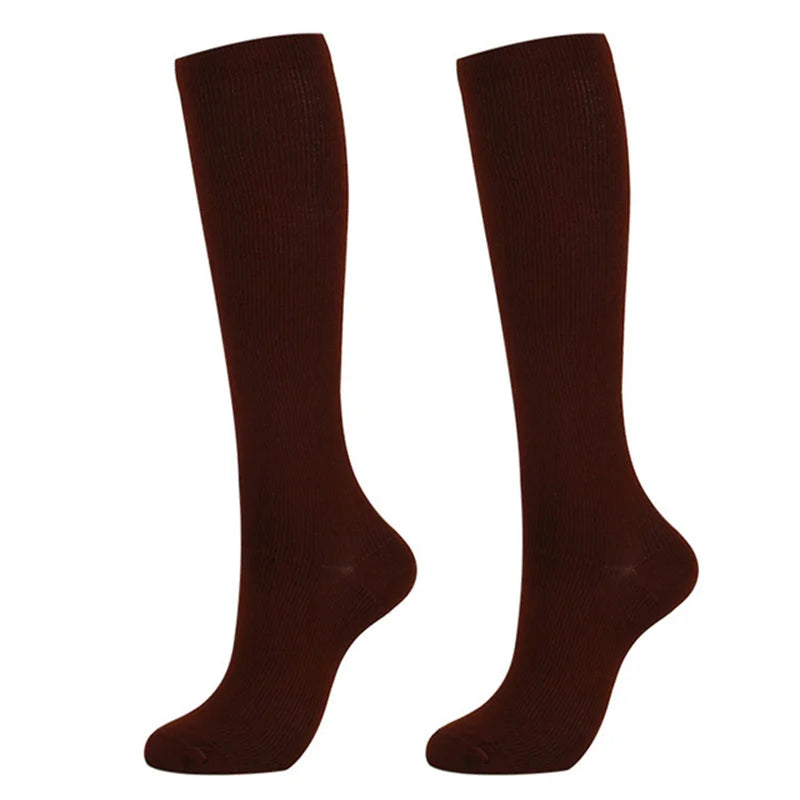 Pair of dark maroon medical grade compression socks for veins and circulation