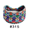 Boho knotted cotton headband featuring a colorful geometric pattern in purple, green, orange, and white.