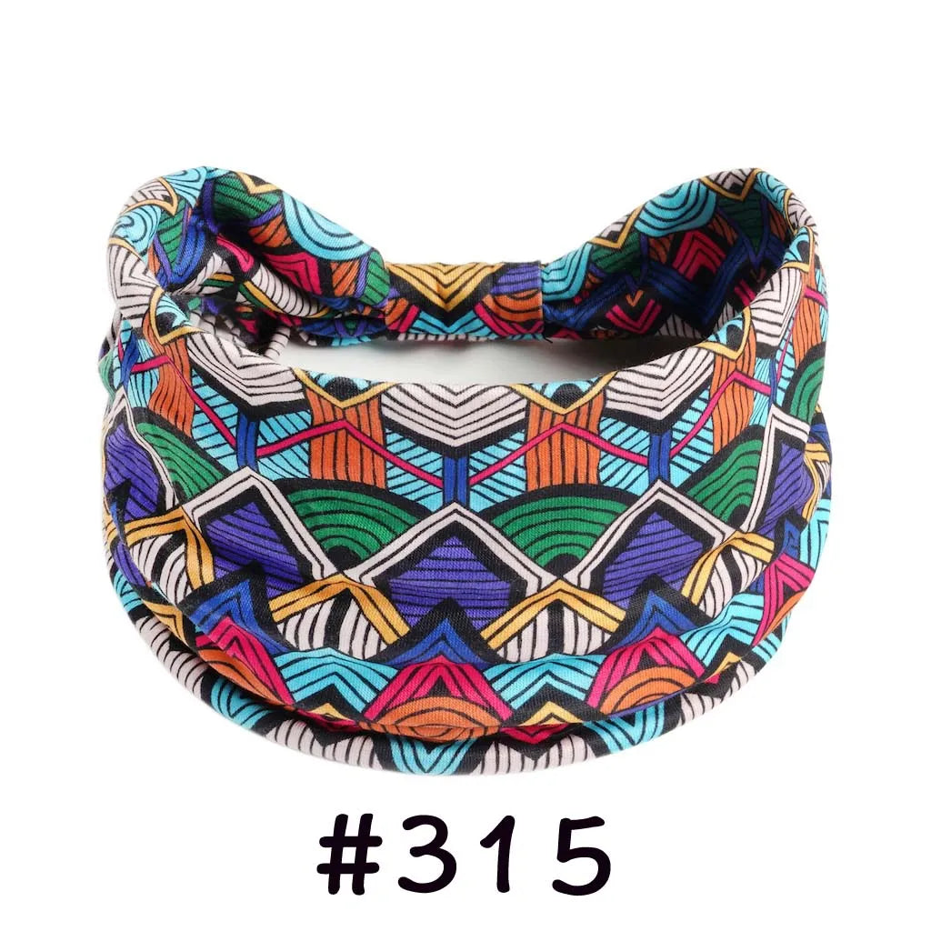 Boho knotted cotton headband featuring a colorful geometric pattern in purple, green, orange, and white.