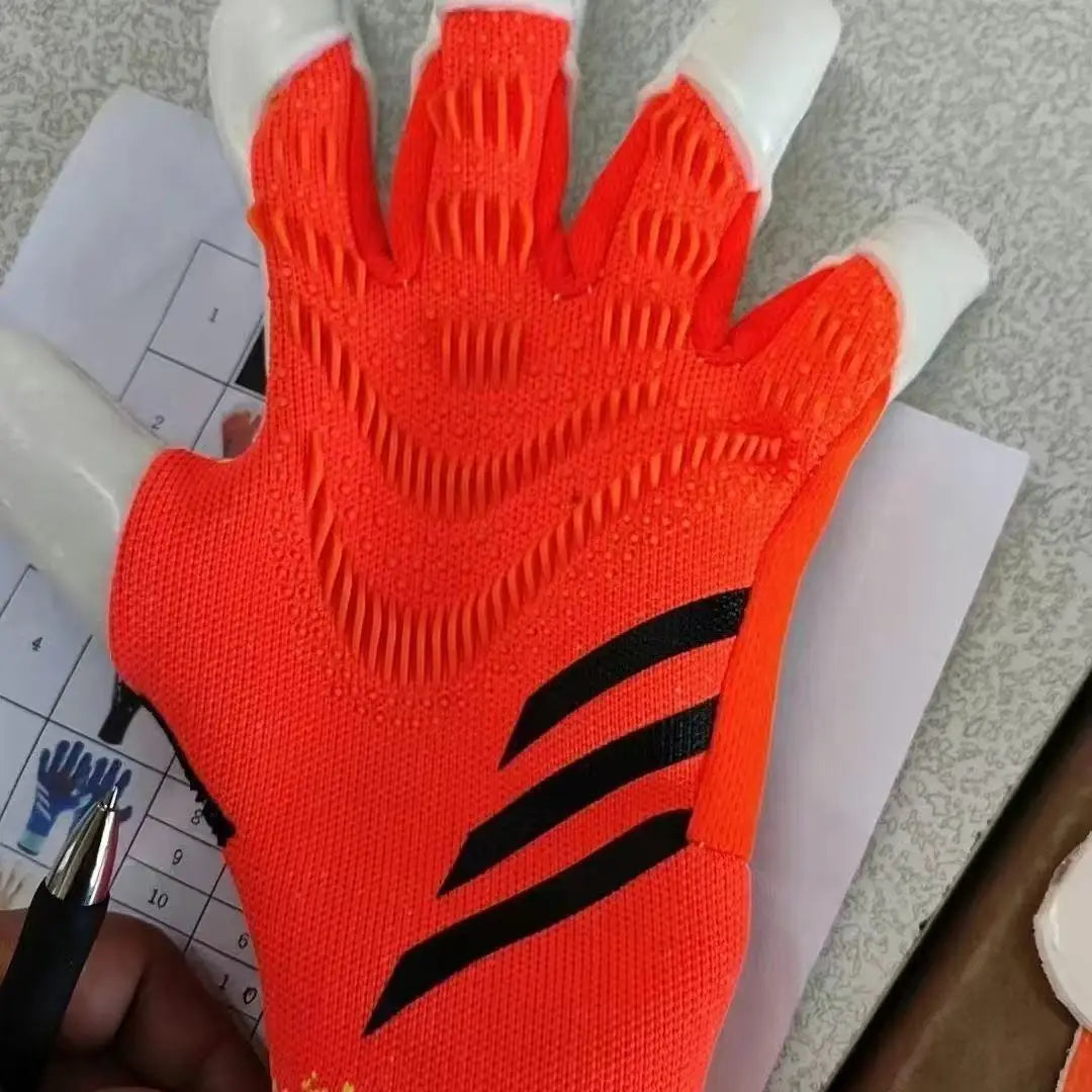 Orange latex goalkeeper football gloves with black stripes shown on a hand.