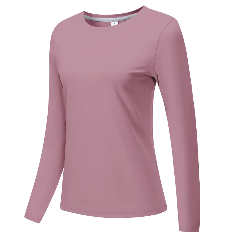 Top de manga larga malva para yoga o correr, mostrado plano.