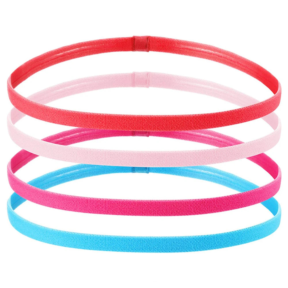 A pack of four non-slip elastic sport headbands in red, pink, magenta, and blue.