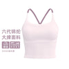 A light pink supportive women's sports bra with a V-neck design.