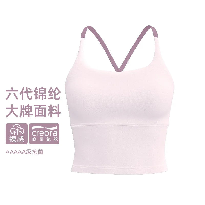 A light pink supportive women's sports bra with a V-neck design.