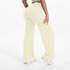 A person is modeling light beige high-waist yoga pants.