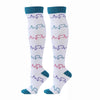 Pair of white compression elastic socks with blue trim and a red heartbeat pattern