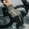 Close-up of a hand wearing black cycling performance gloves for mountain biking or road riding.