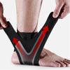 Black ankle support compression sleeve being held by a hand, showing the V-shaped design for pain relief.