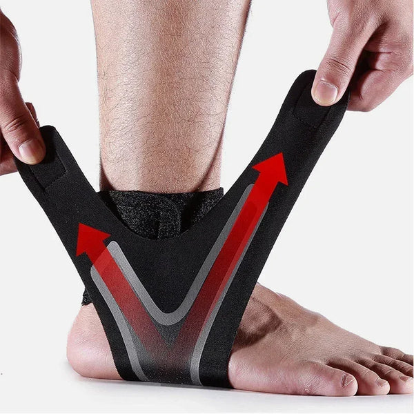 Black ankle support compression sleeve being held by a hand, showing the V-shaped design for pain relief.