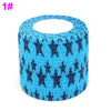A roll of blue and black fruit pattern elastic bandage tape for joints.