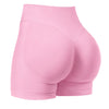 Un short de yoga sans couture rose taille haute, vu de l'arrière.
