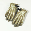 A pair of tan tactical finger gloves with a glow-in-the-dark pattern on the palm and fingers.