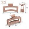 A set of extra large matte claw clips in a nude color, showing various sizes and dimensions.