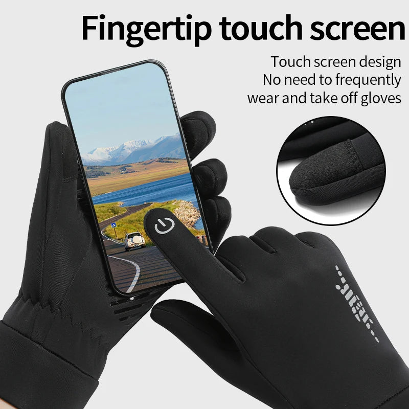 A hand wearing a black fingertip touch screen glove is holding a smartphone displaying a scenic landscape.